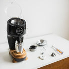 Black Niche Zero with parts laid out on work top ready to be cleaned