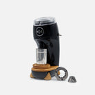 Black Niche Zero next to mazzer 63mm conical burrs
