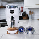 White Niche Duo next to 83mm mazzer flat filter burrs