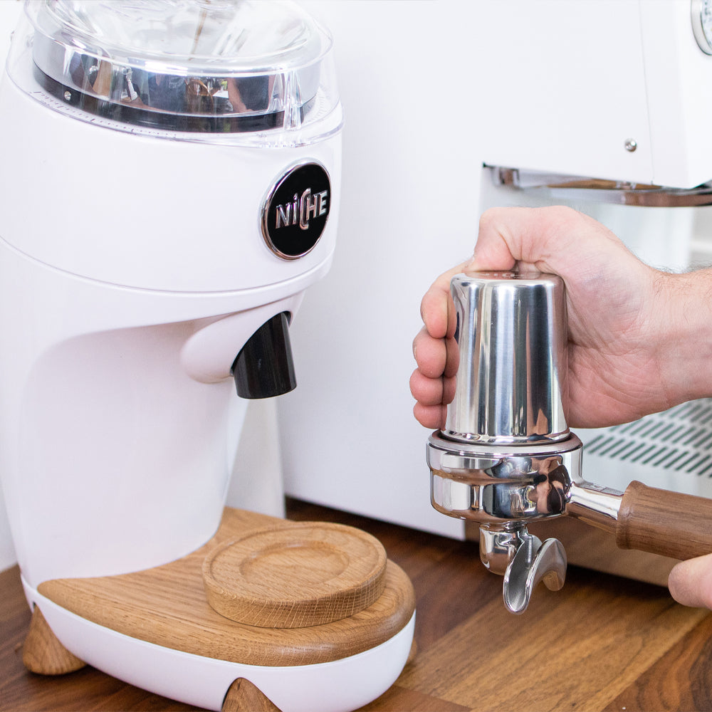 White Niche Duo with grind cup inverted into portafilter