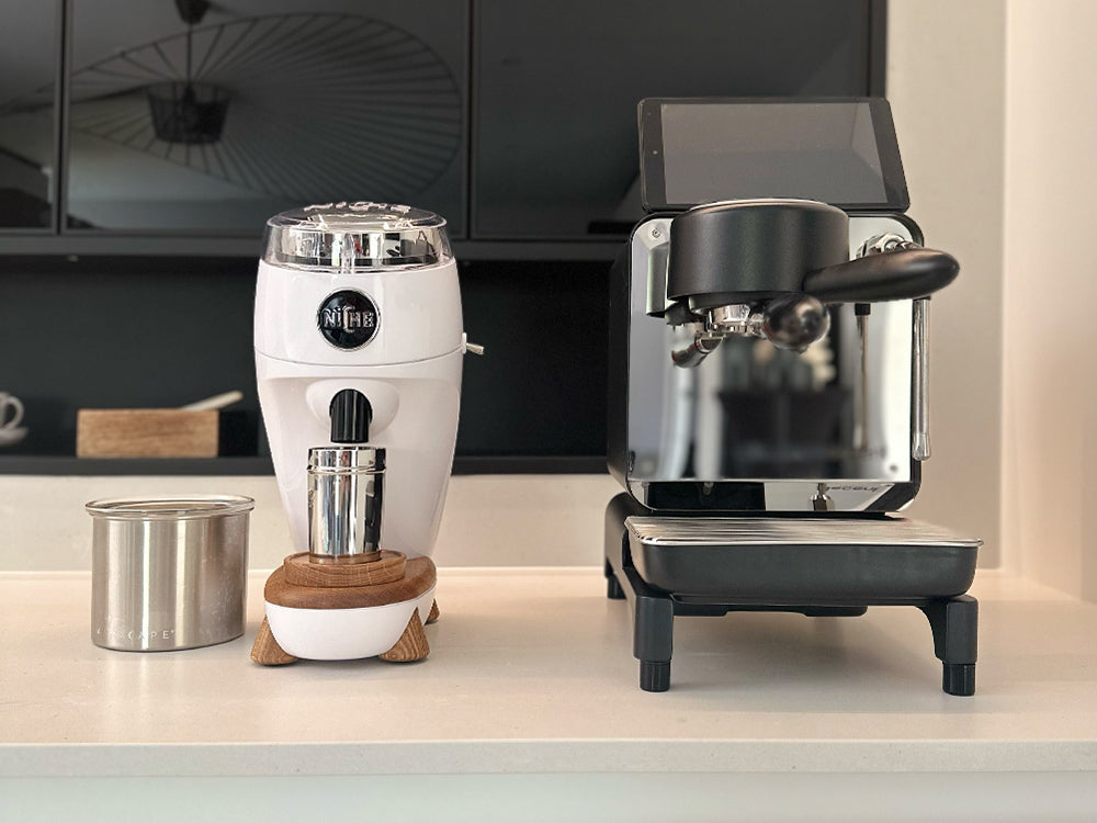 White Niche Duo in kitchen next to decent espresso machine