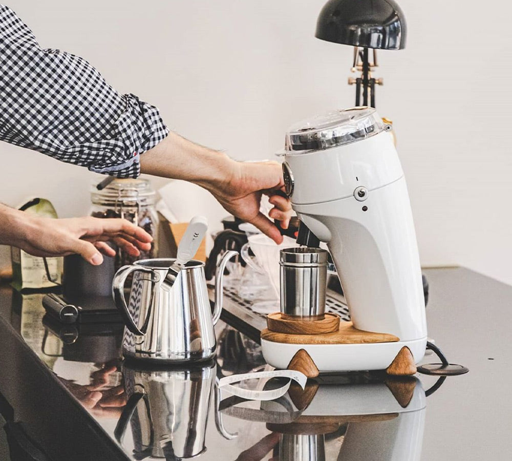 White Niche Zero being used to make filter coffee