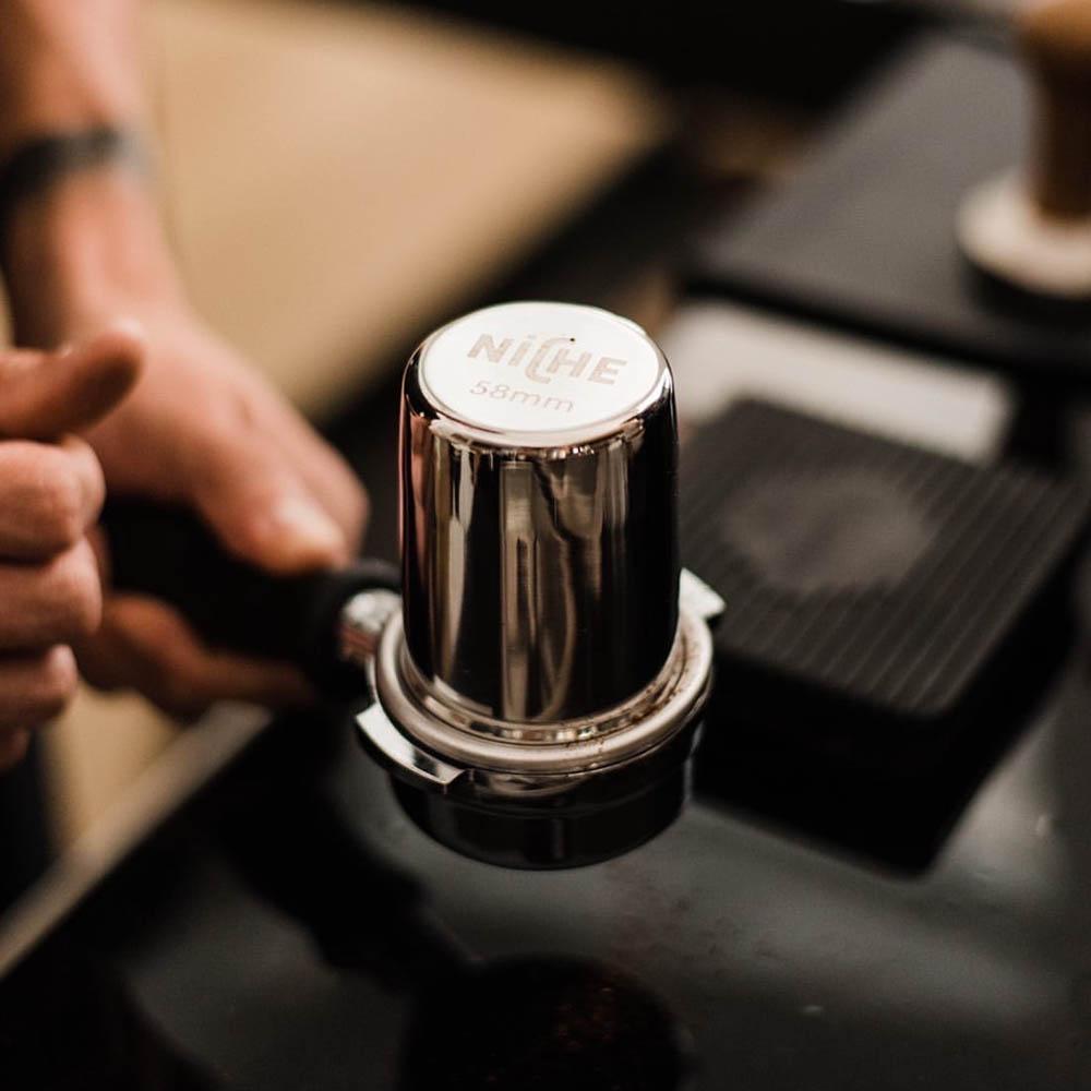 Niche grind cup inverted in portafilter