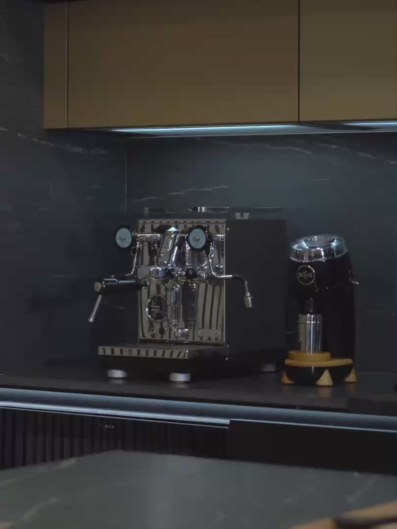 Black Niche Zero and White Niche Duo being used to make espresso and filter coffee during winter