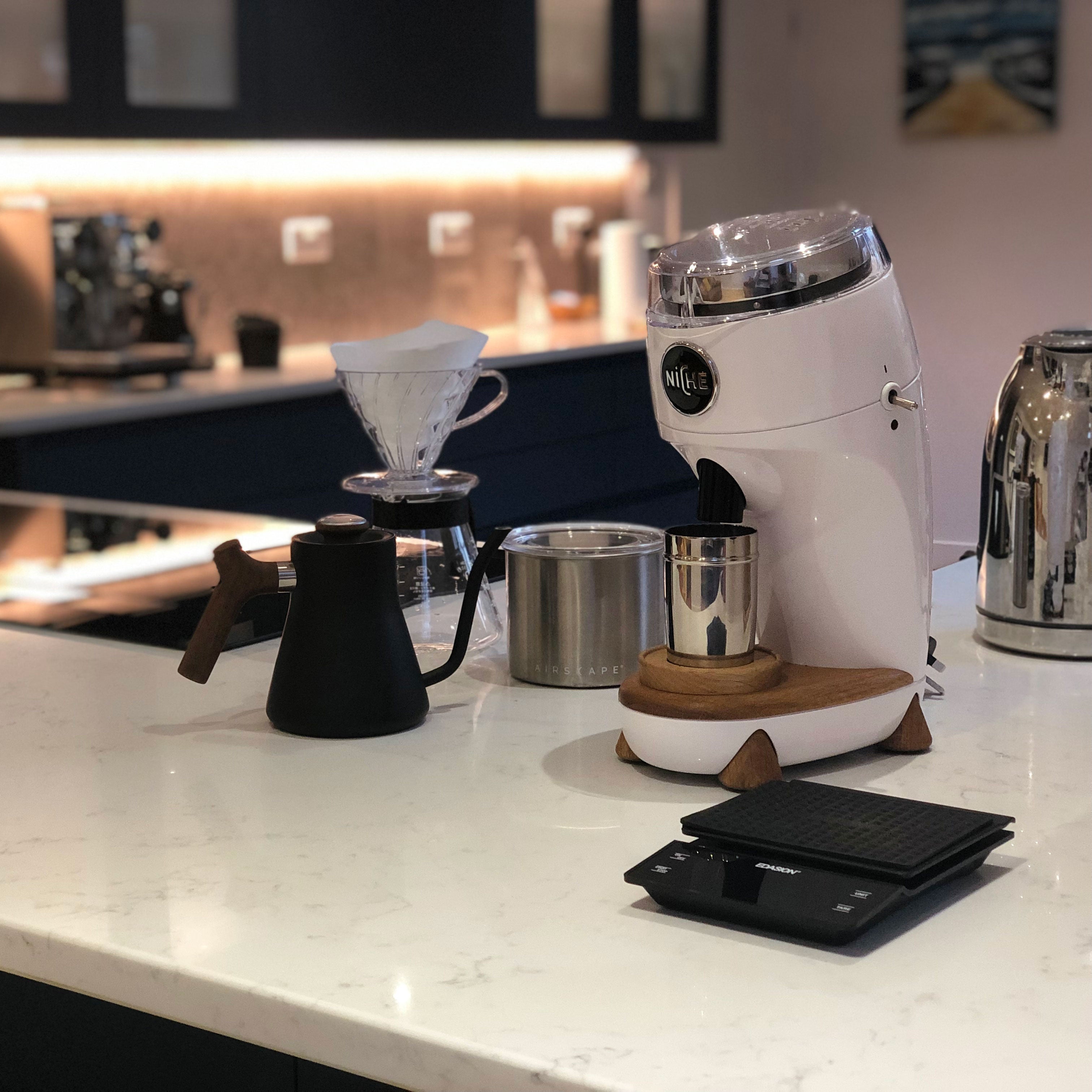 White Niche Duo on kitchen counter next to goose neck kettle and v60